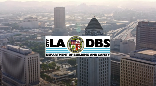 Drone image of downtown Los Angeles with LADBS logo on top